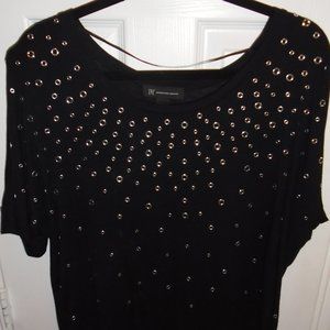 Womens Black top with silver gromet design